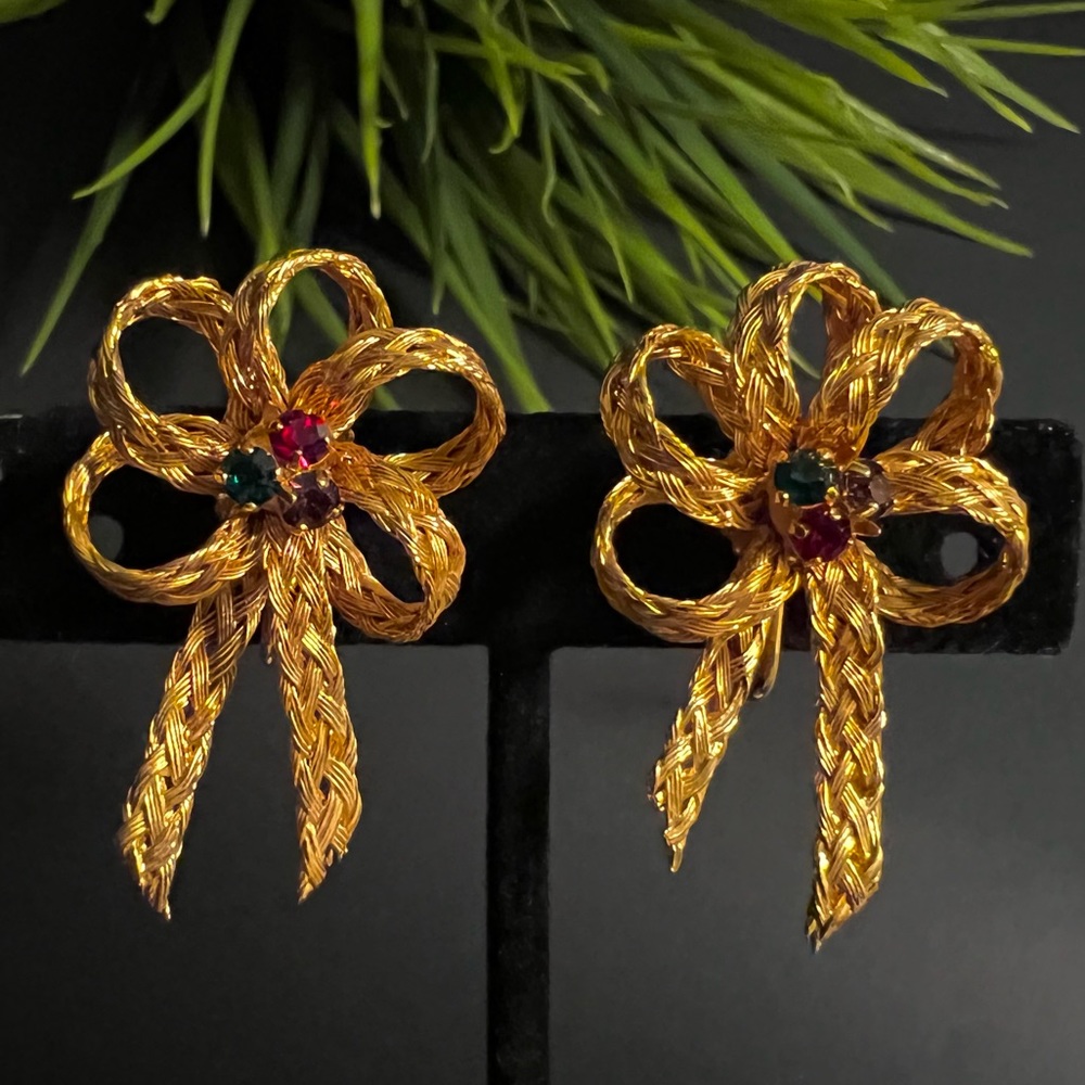 Mid-century featuring unique woven metal ribbon bow rhinestone clip on earrings